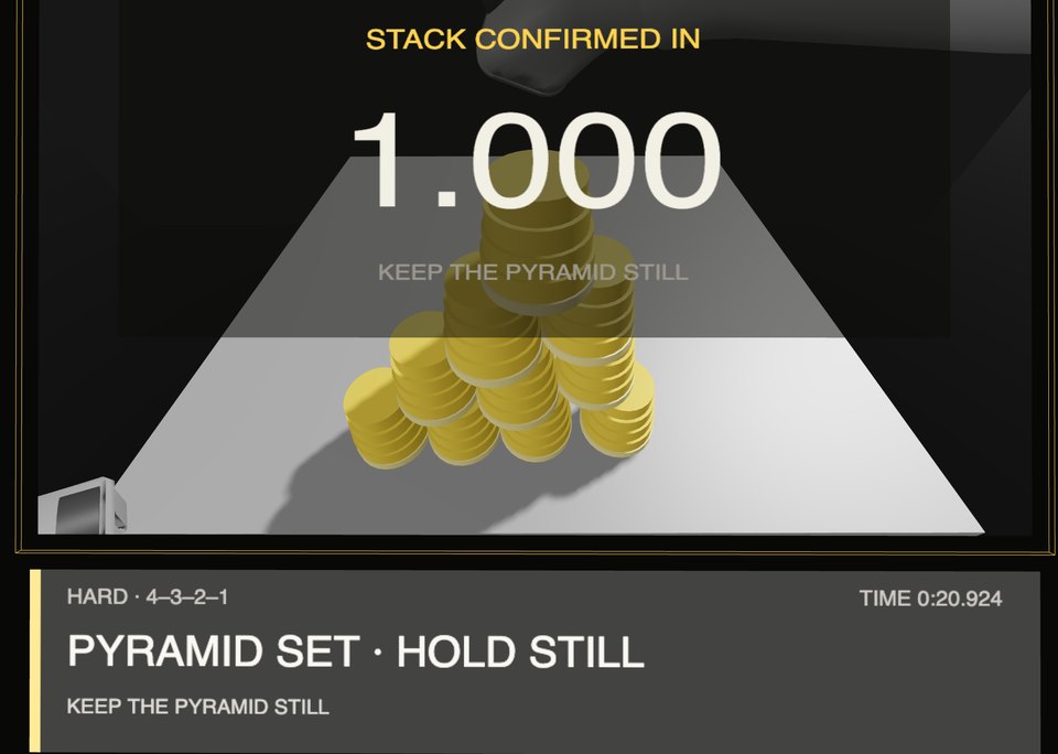 A finished pyramid with the STACK CONFIRMED IN countdown and PYRAMID SET, HOLD STILL